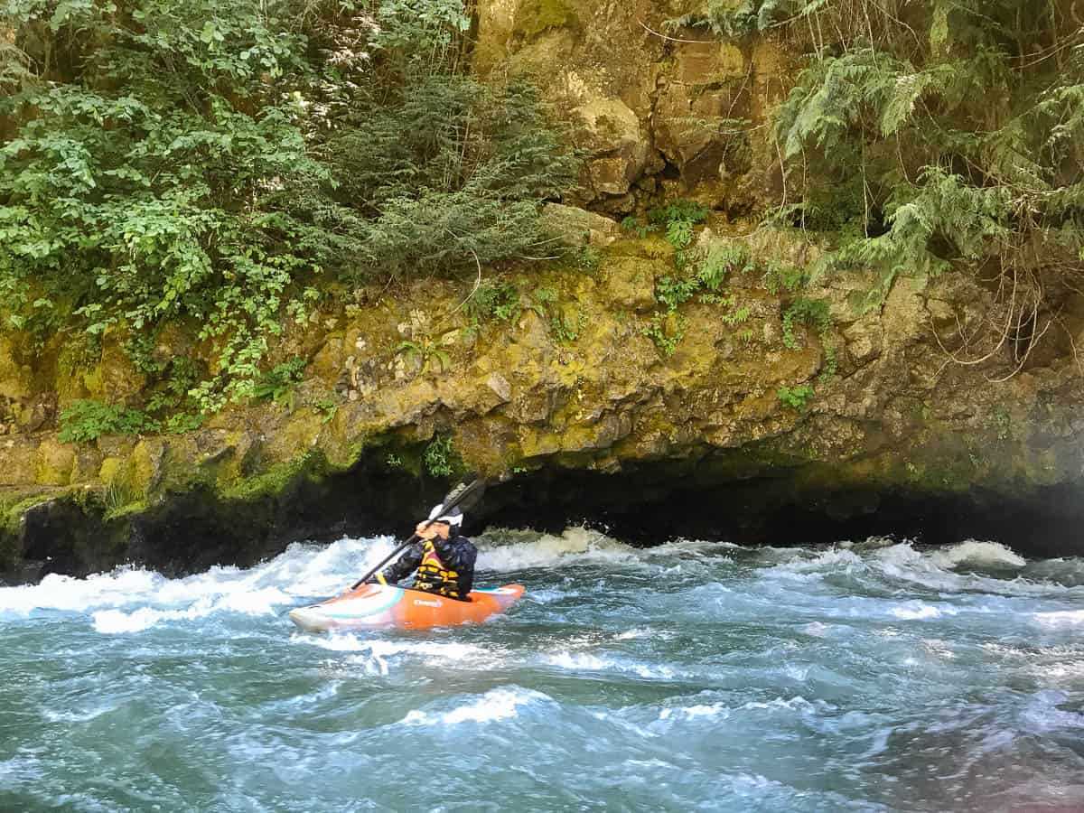 Kayaking left of The Cave on the White Salmon River