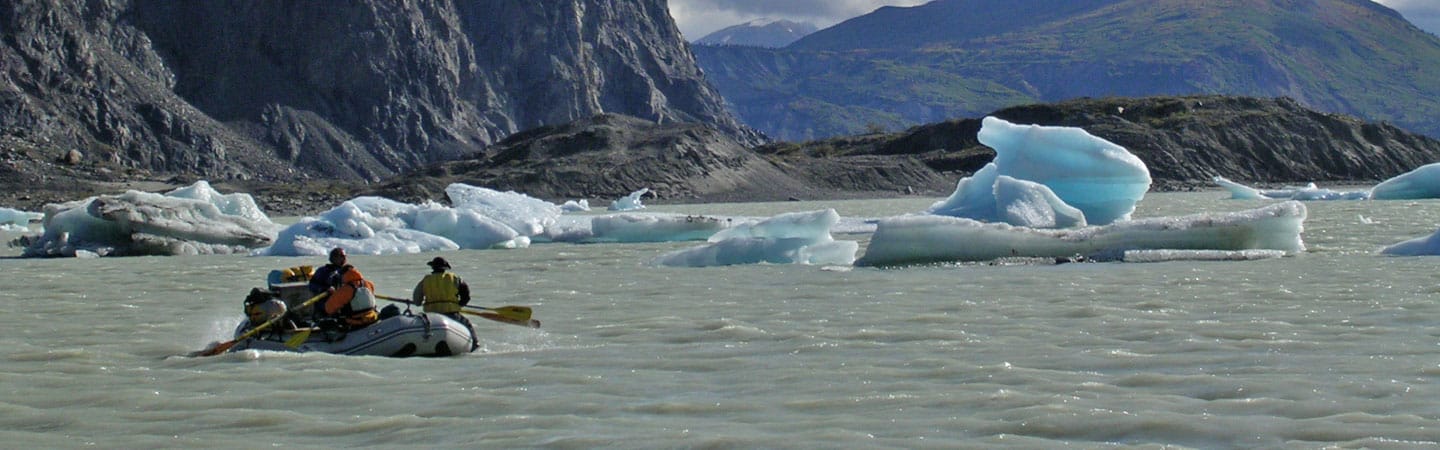 Rowing across Lowell Lake on the Alsek River