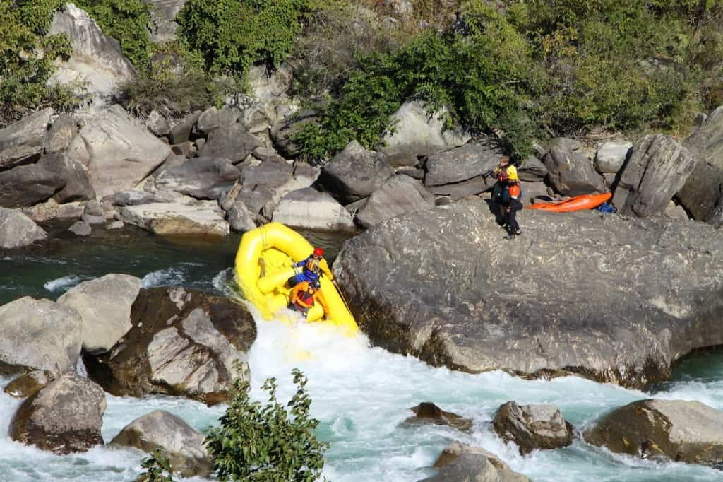 Rafting the first drop of the portage rapid on the Paro Chhu