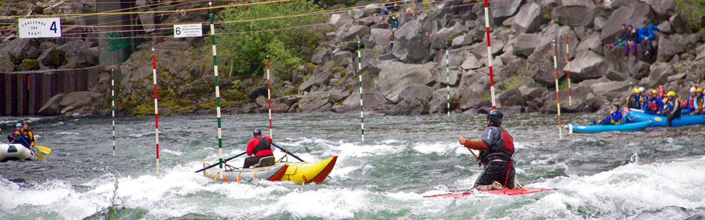Boaters competing in Carter Falls at the Upper Clackamas Whitewater Festival