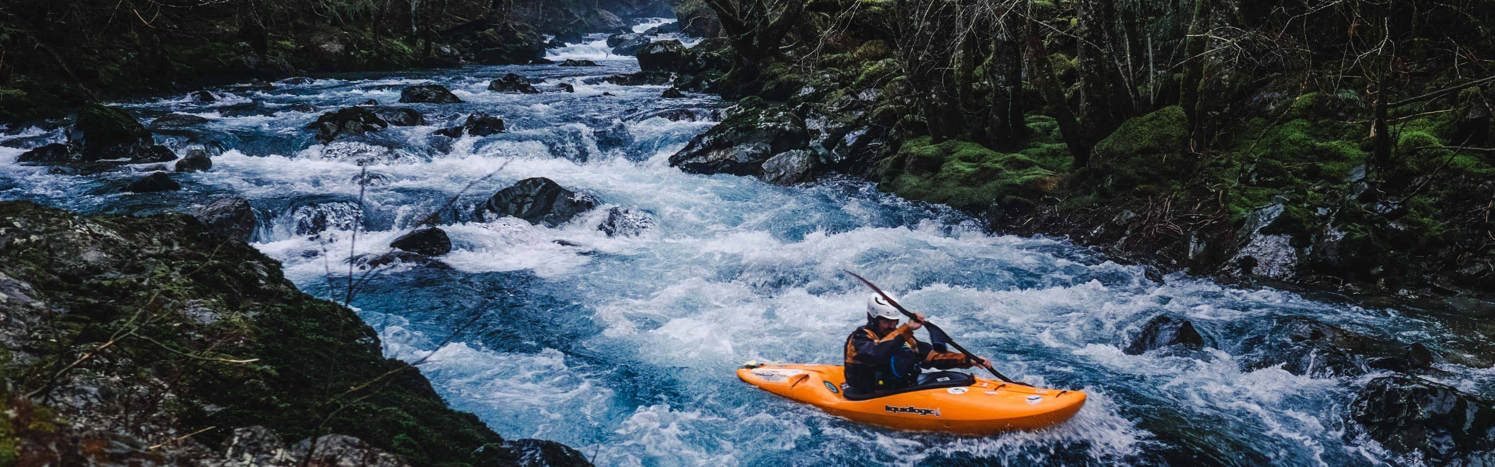 A paddler at the put in rapid on the Hamma Hamma River. Photo by Nate Wilson Photography