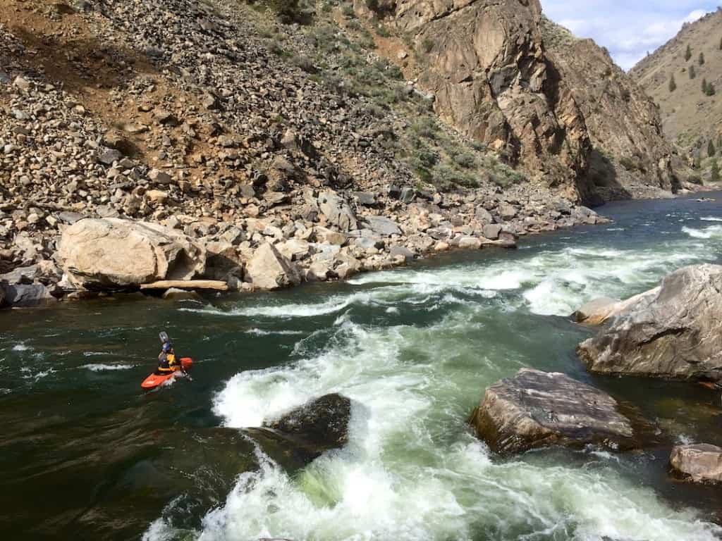 Kayaker paddling Rubber Rapid on the Middle Fork of the Salmon River
