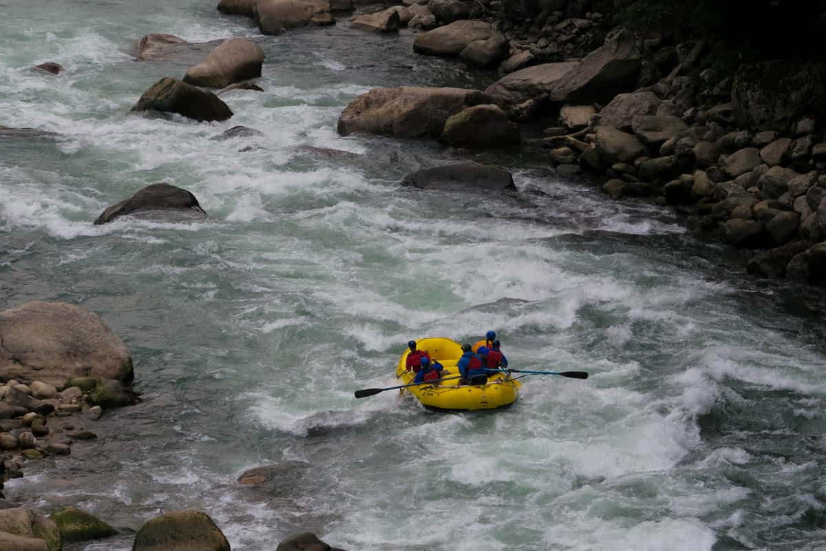 Rafting Khamsum Bridge Rapid in Bhutan