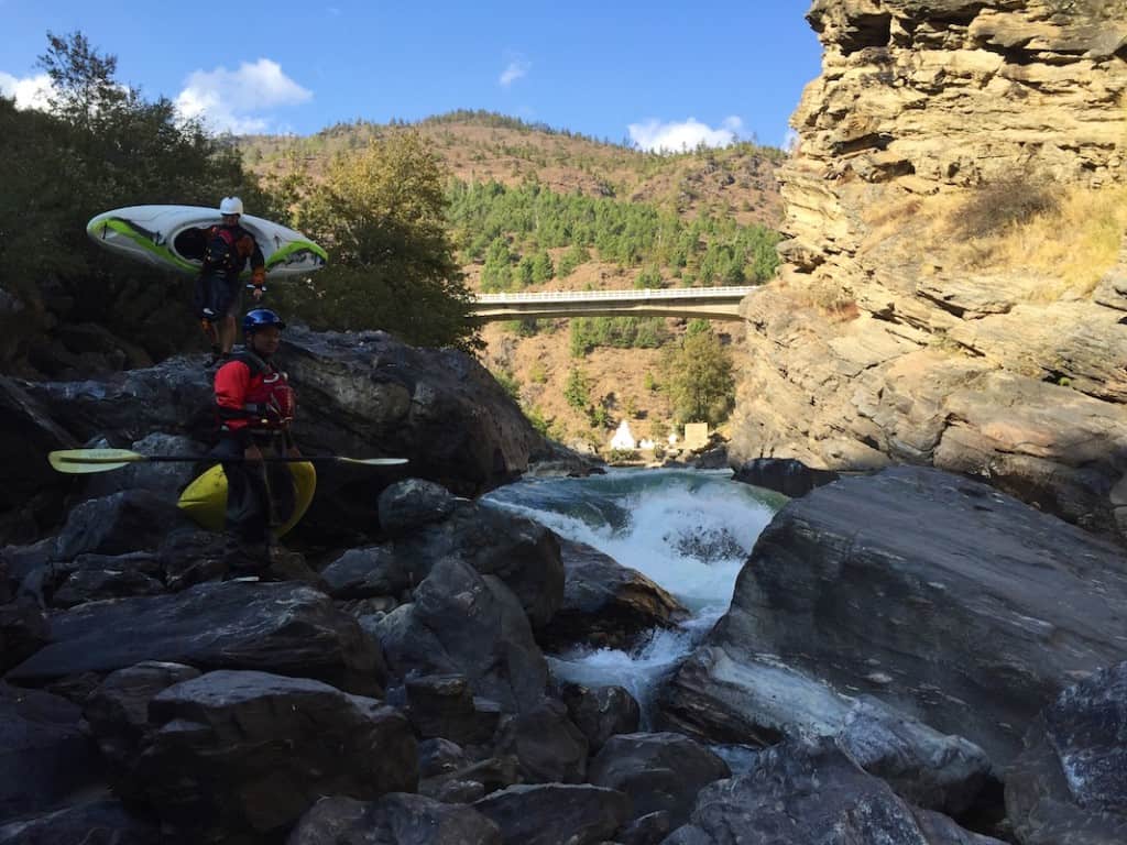 Portaging on the Wang Chhu in Bhutan