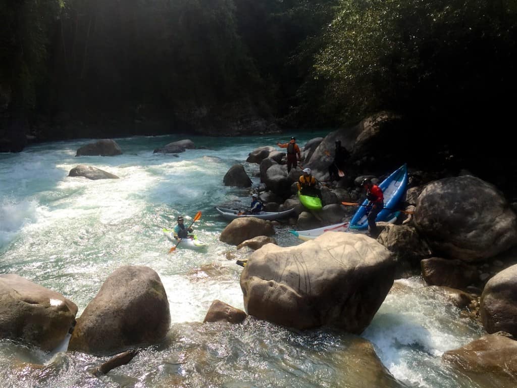 Portaging the first rapid on the Upper Pho Chhu