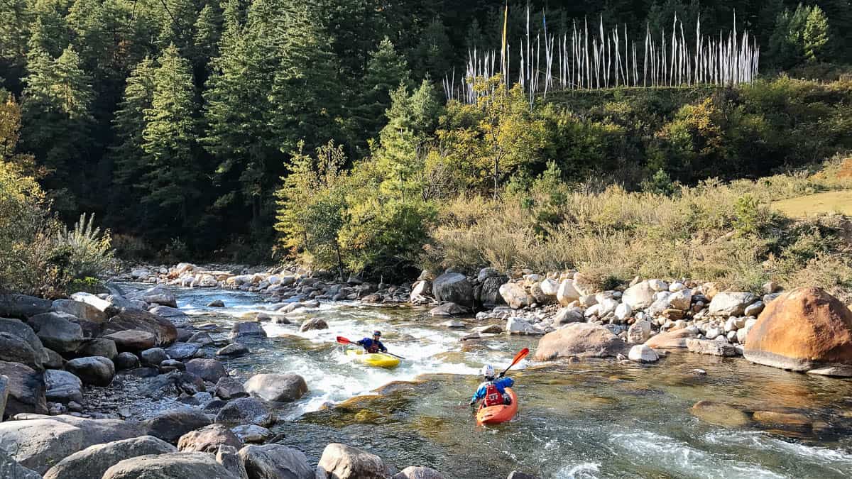 Enjoying one of many fun creek rapids