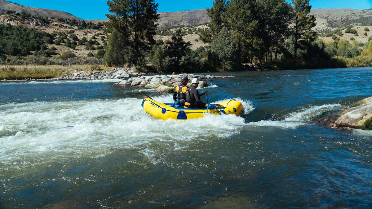 Raft surfing at the Gore Canyon Whitewater Park