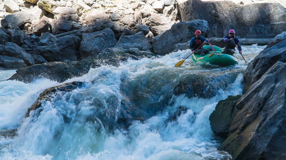 Raft driving left at Pyrite Falls