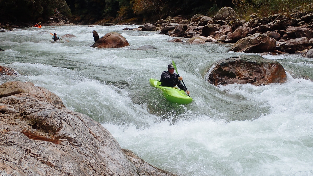 Kayaking Ignorance Rapid on the Mangde Chhu in Bhutan