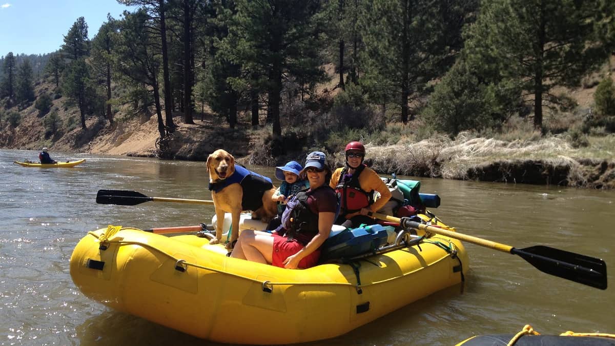 A family enjoys a float down the East Fork of the Carson River.