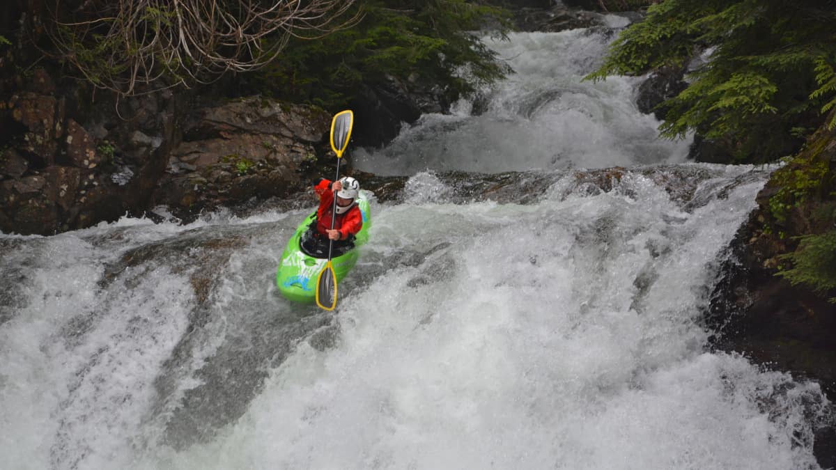 A kayaker runs the last drop of the Fearsome Foursome.