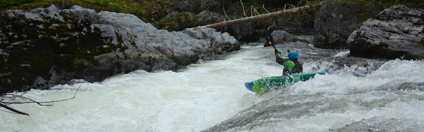 A kayaker runs First Drop on Canyon Creek.