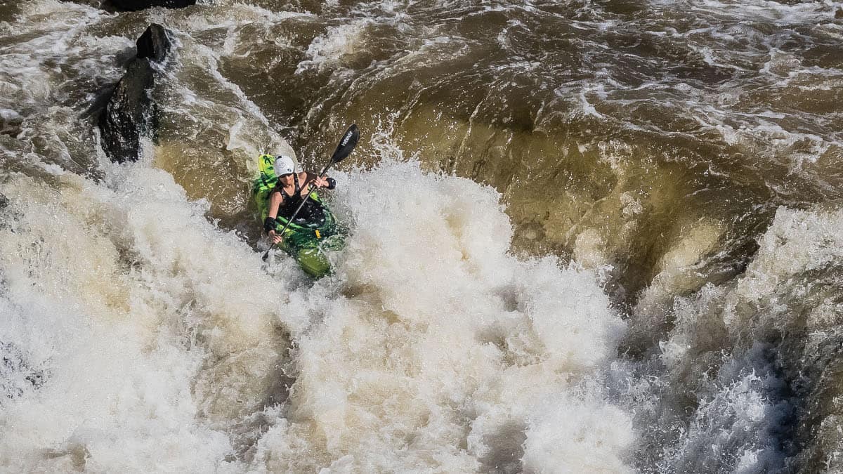 A kayaker runs the Back Canyon channel on the Great Falls of the Potomac.