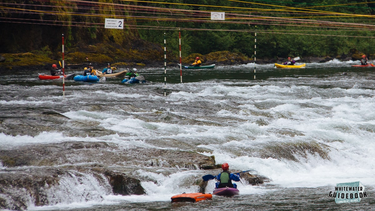 Inflatable Kayakers competing in Carter Falls during the Upper Clackamas Whitewater Festival